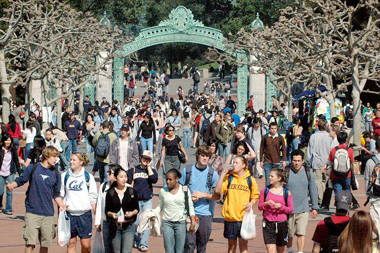Students walking on Sather Gate at UC Berkeley